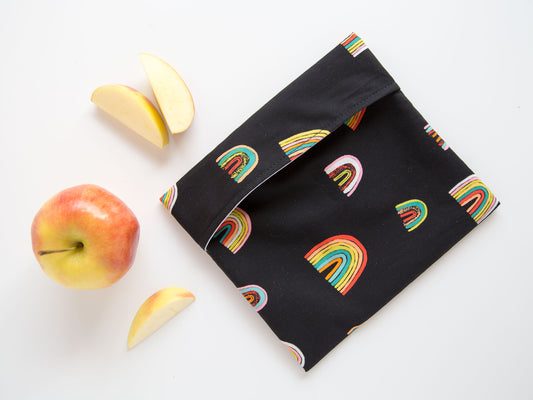 black snackbag with rainbows on it.