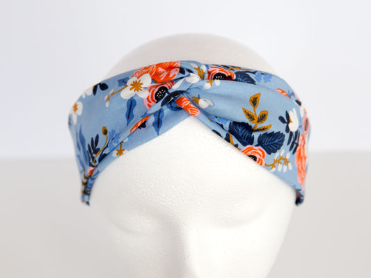 light blue rifle paper floral headband on a mannequin